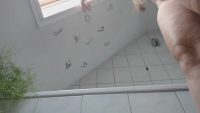 Shitting Naked over Edge of the Tub 00001